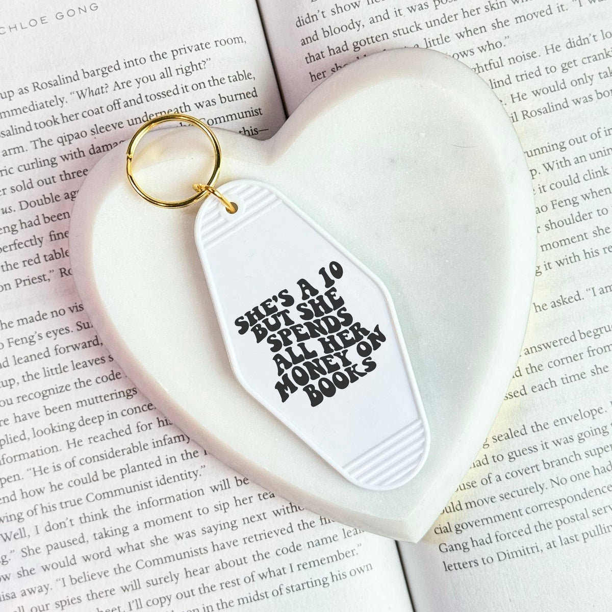 The Swoon Room - She's a Ten But Spends All Her Money On Books Motel Keychain