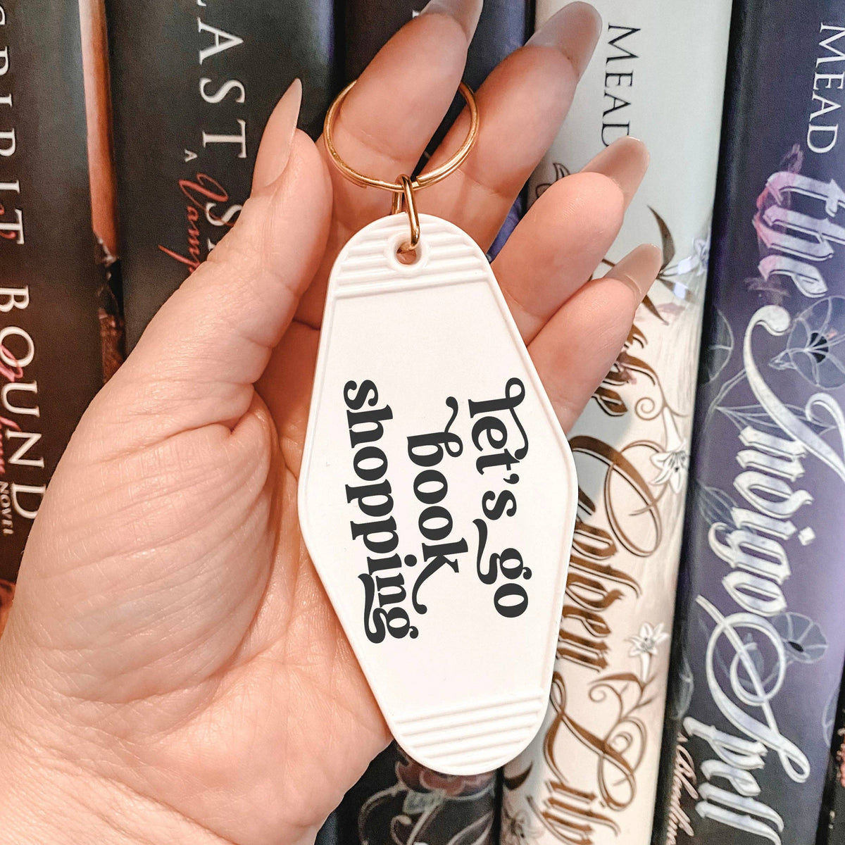 The Swoon Room - Let's Go Book Shopping Motel Keychain